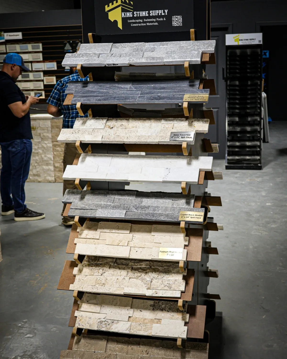 Ledgestone and veneer samples on the showroom rack